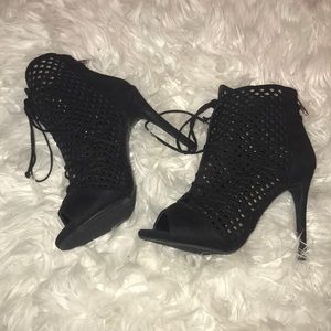 Lace up black booties